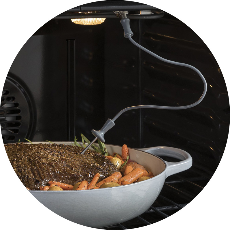 Meat probe inserted into roast for precision cooking